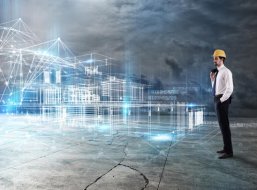 Ein Architekt blickt auf eine futuristische, digital projizierte Gebäude-Gitterstruktur.