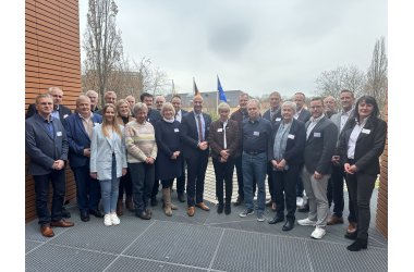 Landrätin Karina Dörk und Landrat Ali Doğan mit Vertreter*innen beider Partnerkreise