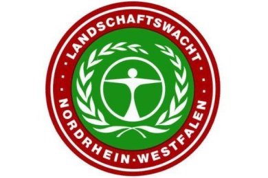Logo Naturschutzwacht NRW, Roter Kreis, in dem der Name in weiß steht, grüner kern des Kreises, mit einer weißen Symbolik.